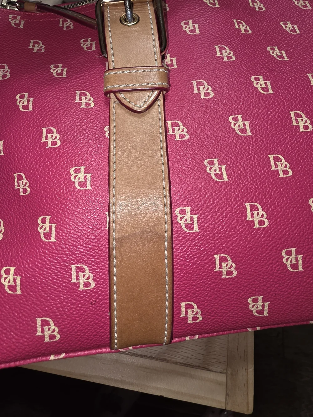 Dooney & Bourke please see
